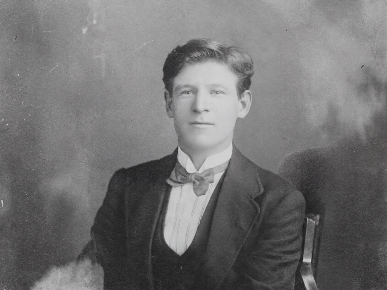 Vintage man portrait photo restored and upscaled - before